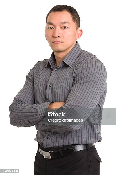Graves Hombre Asiático Atraviesa Brazos Foto de stock y más banco de imágenes de 20 a 29 años - 20 a 29 años, 25-29 años, 30-34 años
