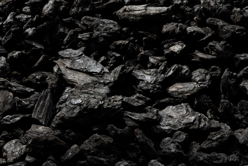 Textured shot of dark coal.