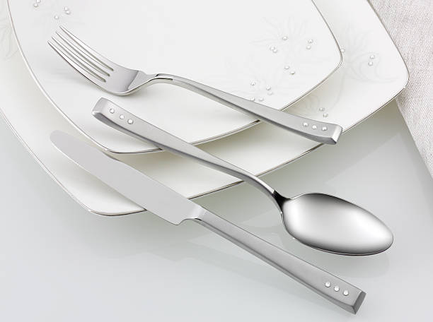 istock Elegant fork, knife, spoon and plate set 184960695