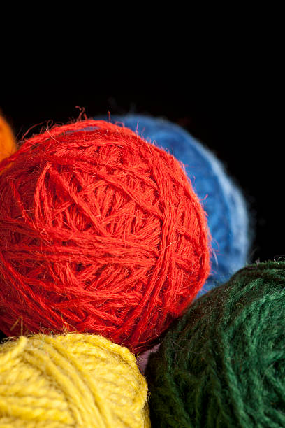 istock Close  To Four Colorful Thread Balls Vertical 184960697
