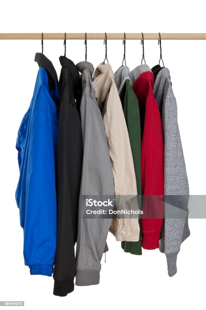 Jackets Hanging on Rack "Jackets hanging on a rack, isolated on white.Please also see:" Hanging Stock Photo