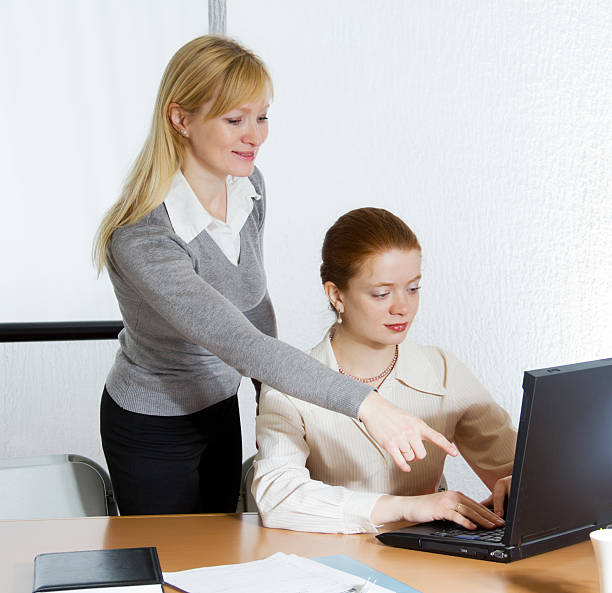 istock Businesswomen are working in the office. 184961234