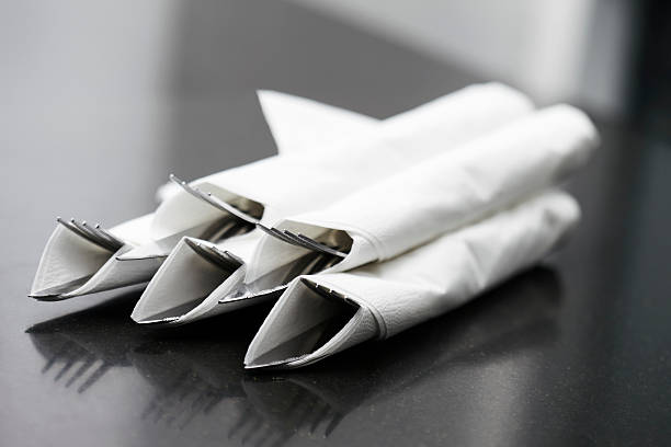 Luxury hotel/home table setting for fine dining. With glassware and blurred background.