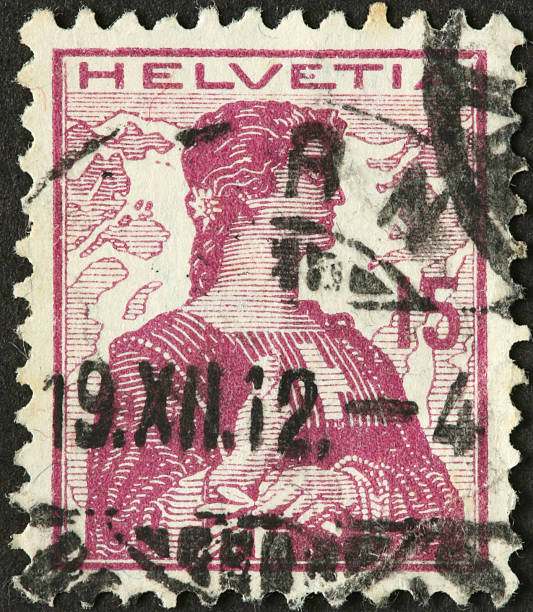 istock woman with sword on an old Swiss postage stamp 184961769