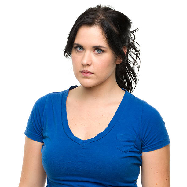 istock Serious Young Woman Looking At Camera 184961780