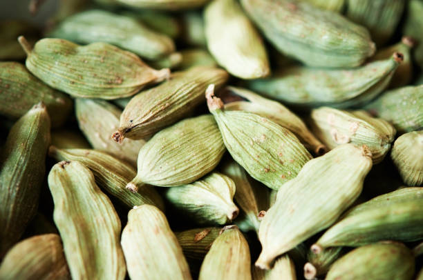 Whole Cardamom Close Up of Whole Cardamom Pods cardamom stock pictures, royalty-free photos & images