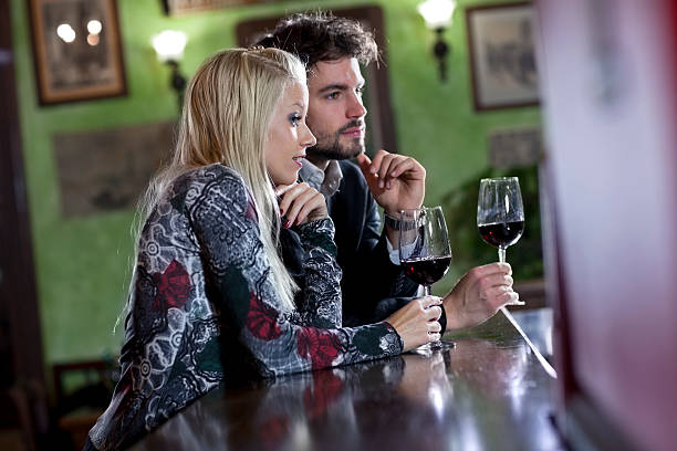 istock friend at the bar, drinking wine 184962817