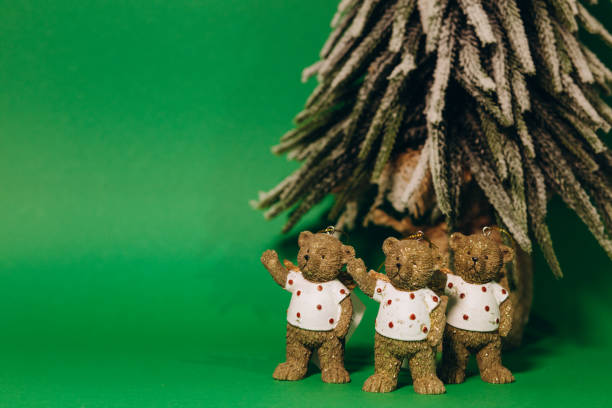 istock Christmas expectations concept - teddy bear in a on a green background 1849631979