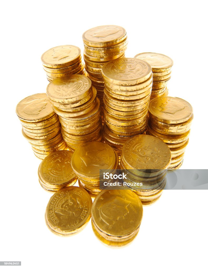 golden coins on white Stack of golden coins on white background Abundance Stock Photo
