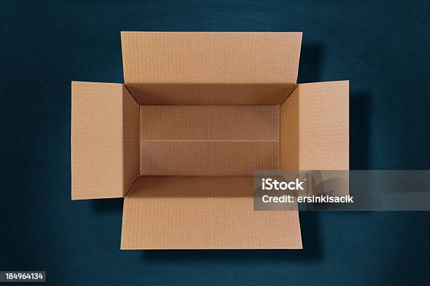 Top View Of An Empty Cardboard Box Stock Photo - Download Image Now - Cardboard Box, Blank, Blue