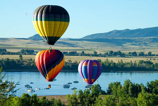 Balloons coming in for a landing at Chatfield Reservoir, Colorado