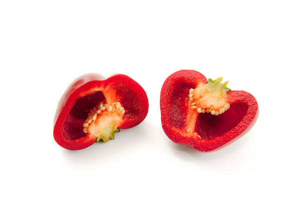 istock Halves of red bell pepper isolated on white background with clipping path. 1849646773