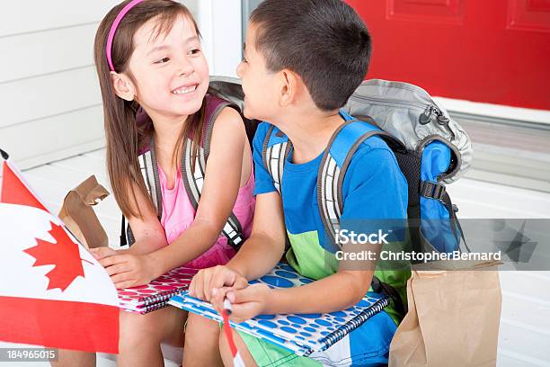 Siblings Student Holding Canadian Flag Stock Photo - Download Image Now - Canada Day, Candid, Lifestyles