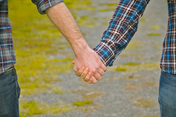 istock Gay Men Holding Hands 184965293