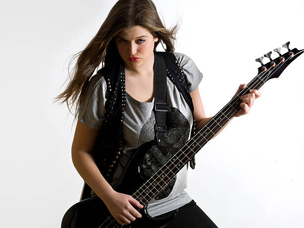 istock Woman with a bass guitar 184965368