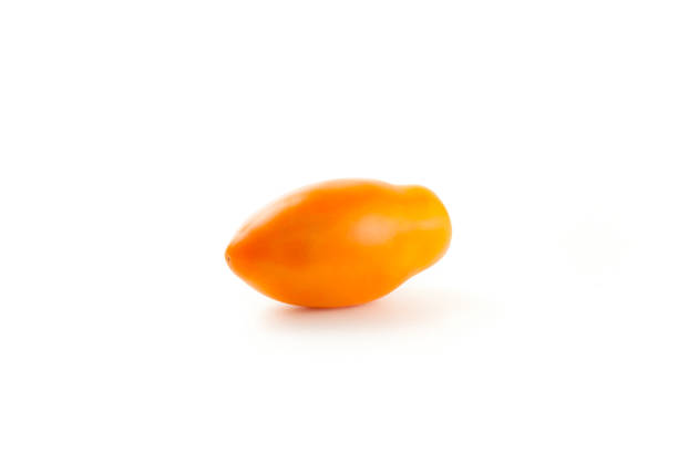 istock Yellow tomato isolated on white background with clipping path. 1849653778