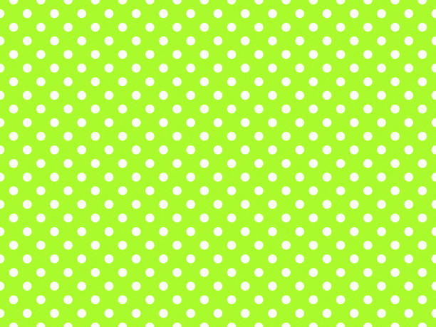 istock texturised white color polka dots over green yellow background 1849655391