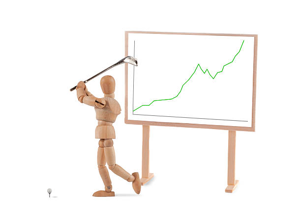 istock Wooden Mannequin and business graph enjoys golf 184965740