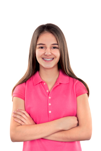 Teenage girl showing off her braces