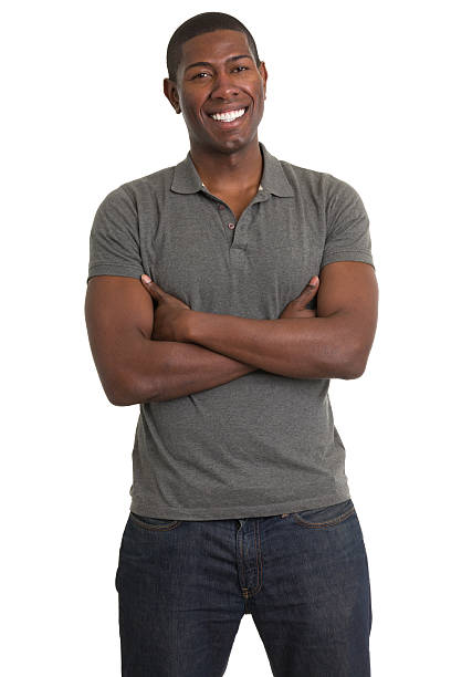 pie joven sonriente - polo shirt african ethnicity men african descent fotografías e imágenes de stock
