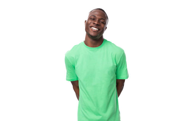 young lucky 30 year old American guy dressed casually in a basic t-shirt and jeans