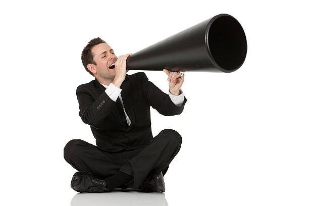 istock Businessman shouting into a bullhorn 184966650