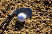 golfball-und-pitching-wedge-in-sand-trap.jpg?b=1&s=170x170&k=20&c=SphnBKhAXs0VFArn--pQ7gZLfAD9s7mL00vm17oIb_I=