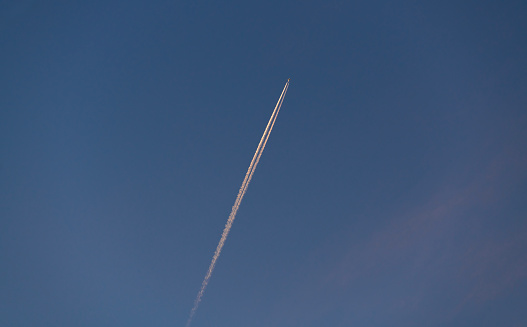 Airplane in the blue  sky.