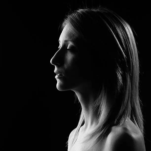 Photo of Pensive Young Woman Portrait.Black And White