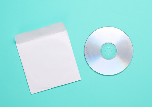 Cd disk with white pack mockup on blue background