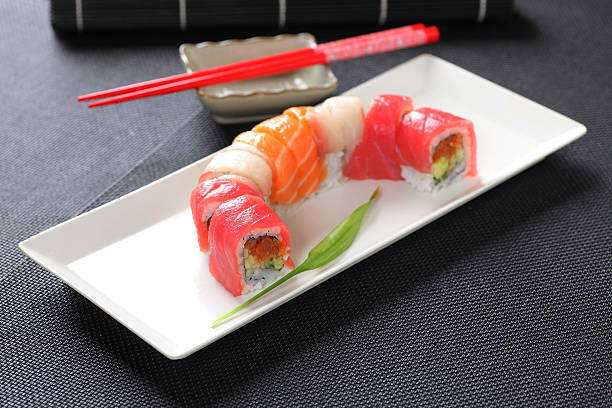 rainbow rolls Japanese sushi rainbow rolls with Spicy Tuna inside rainbow crab stock pictures, royalty-free photos & images