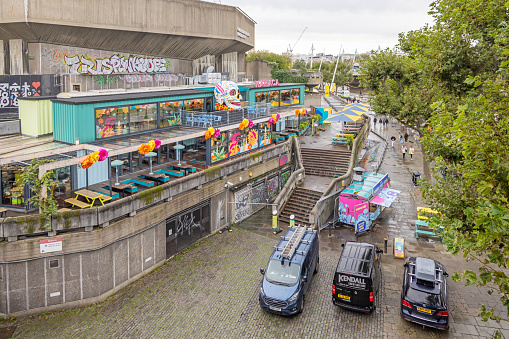 South bank of river Thames, London, England - October 27th 2023:  Surroundings of the Hayward Gallery with attempts to make the concrete building from 1968 looking more colorful