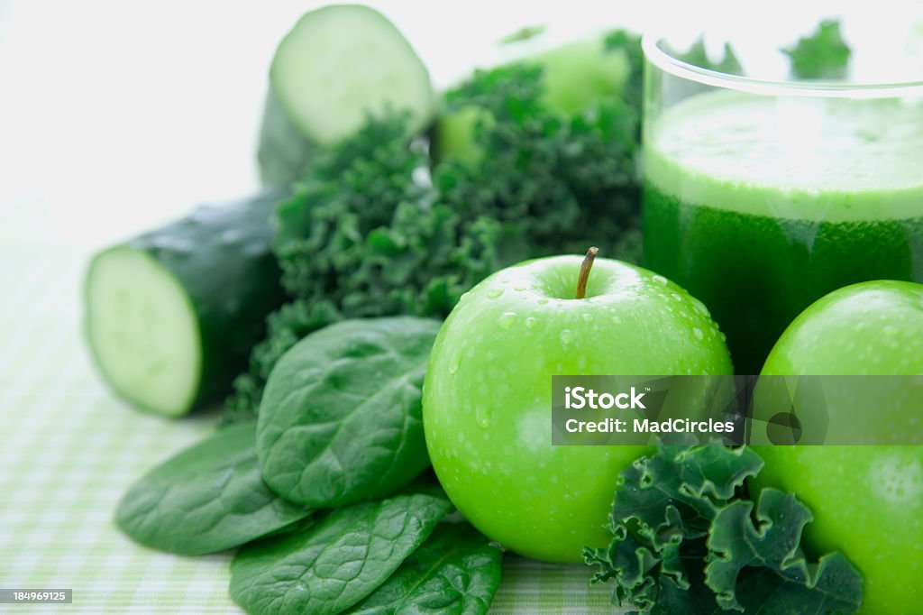 Green Juice Close up of fresh green juice made from organic fruits and vegetables. Kale Stock Photo Green Juice Close up of fresh green juice made from organic fruits and vegetables. Kale Stock Photo