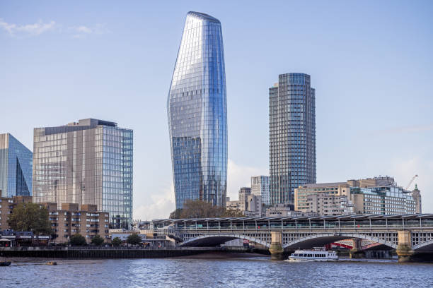 North bank of river Thames, London, England - October 28th 2023:  View to One Blackfriars which is a modern skyscraper with the Southwark Bridge in front