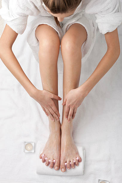 istock woman at spa - legs detail 184969315