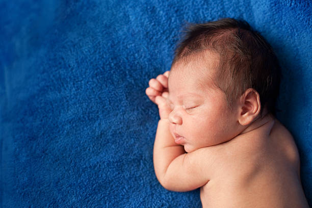 Color Image of Baby Boy Sleeping Peacefully, With Copy Space