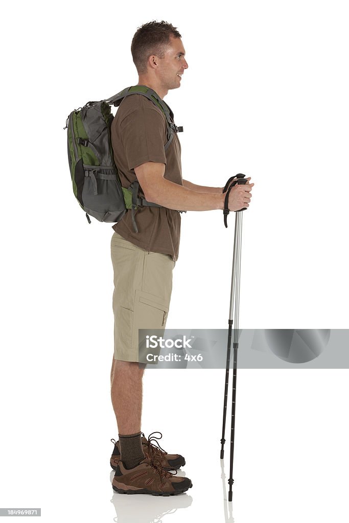 Profile of  hiker with hiking pole 20-29 Years Stock Photo