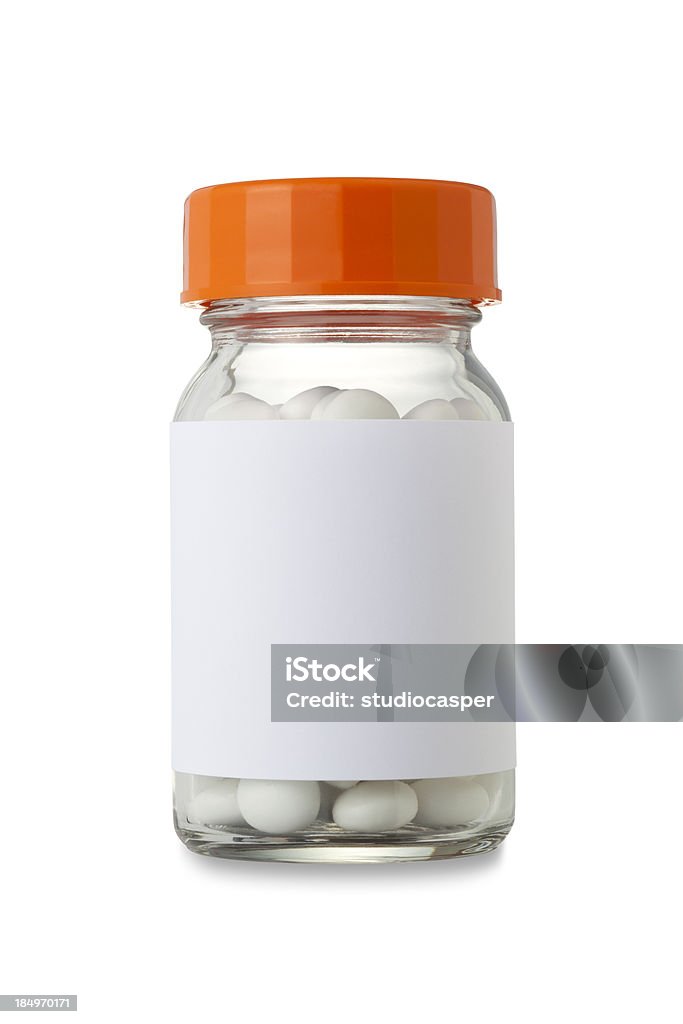 Unlabeled medicine bottle full of white pills medicine bottle (clipping path) Pill Bottle Stock Photo