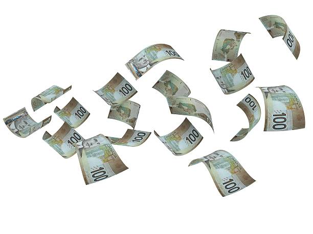 volare canadese dollari - banconota di dollaro canadese foto e immagini stock