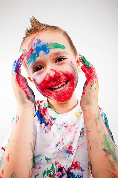 istock Boy having fun with finger paint XXXL 184970307
