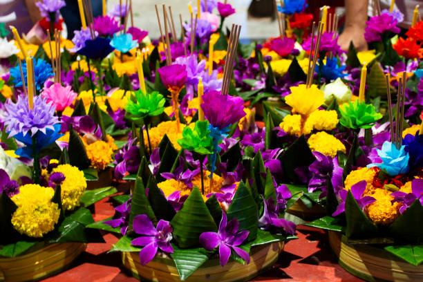 istock Colorful handmade krathong or floating lantern basket sale thai people into float ritual vessel at river for forgiveness from Khongkha Goddess of water in Loy Krathong festival in Nonthaburi, Thailand 1849703855