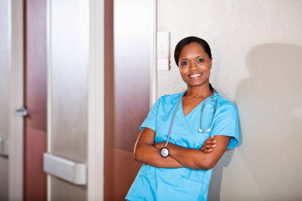 istock Healthcare worker standing in hallway 184970510