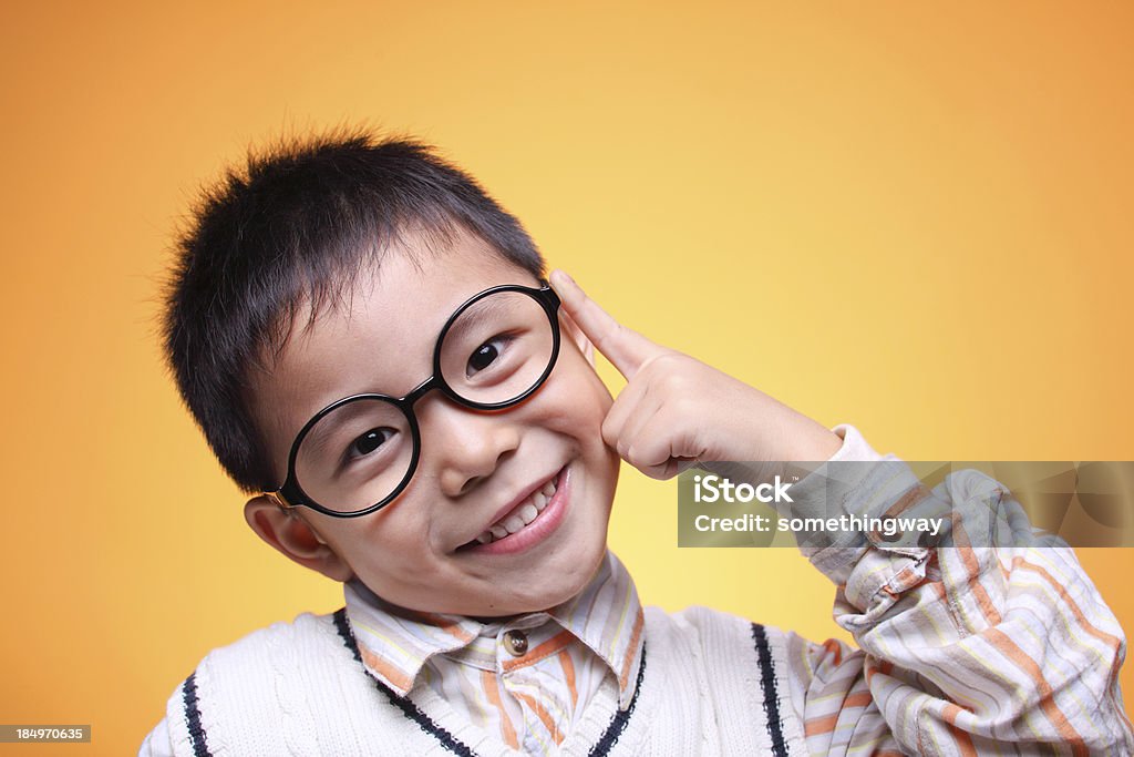 Primo piano di un ragazzo asiatico - Foto stock royalty-free di Bambino