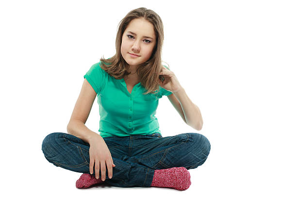 istock Girl sitting on the floor 184970818