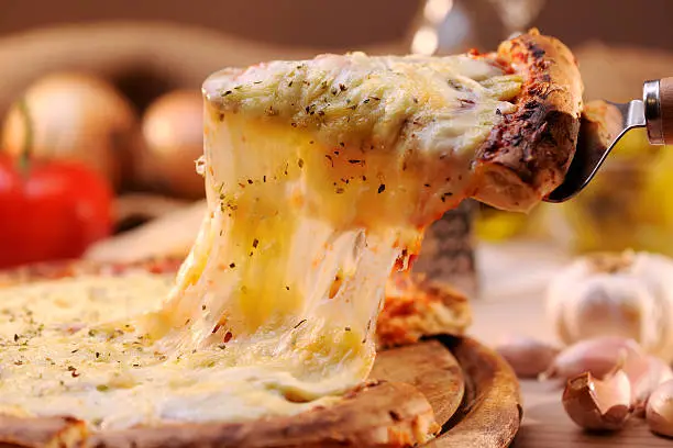 Pizza margharita with melted cheese