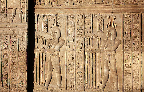 Hieroglyphics Depicting The Making of Perfume "Temple of Kom Ombo, Egypt." hieroglyphics photos stock pictures, royalty-free photos & images