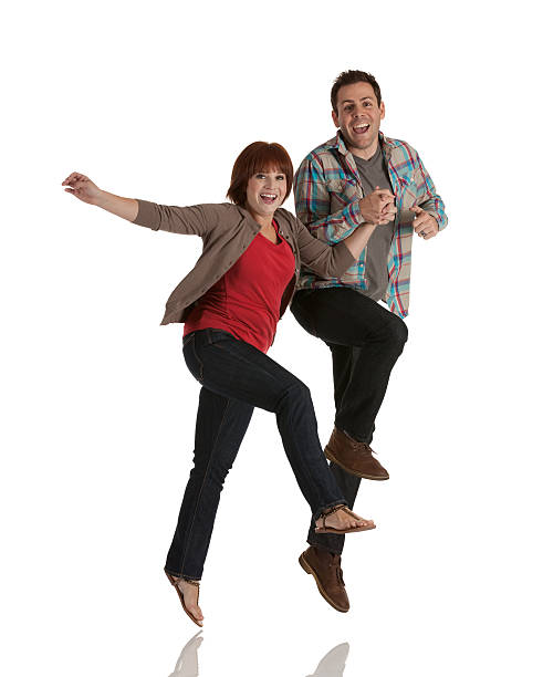 istock Portrait of a couple jumping 184970996