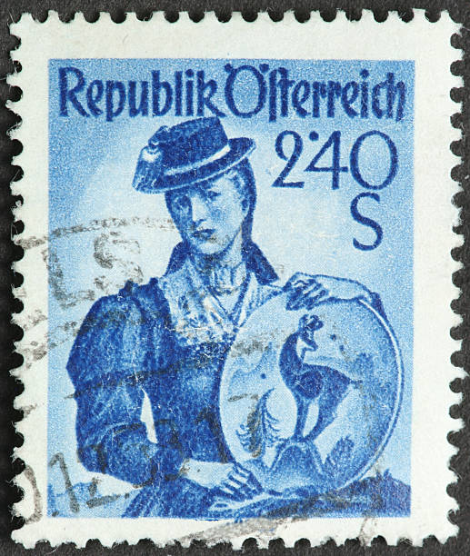 istock vintage woman's fashion on an old Austrian postage stamp 184971131