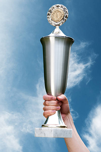 istock Large trophy is liftet up in the air 184971145