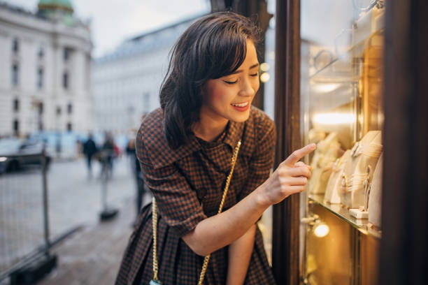istock Modern woman window shopping 1849723575